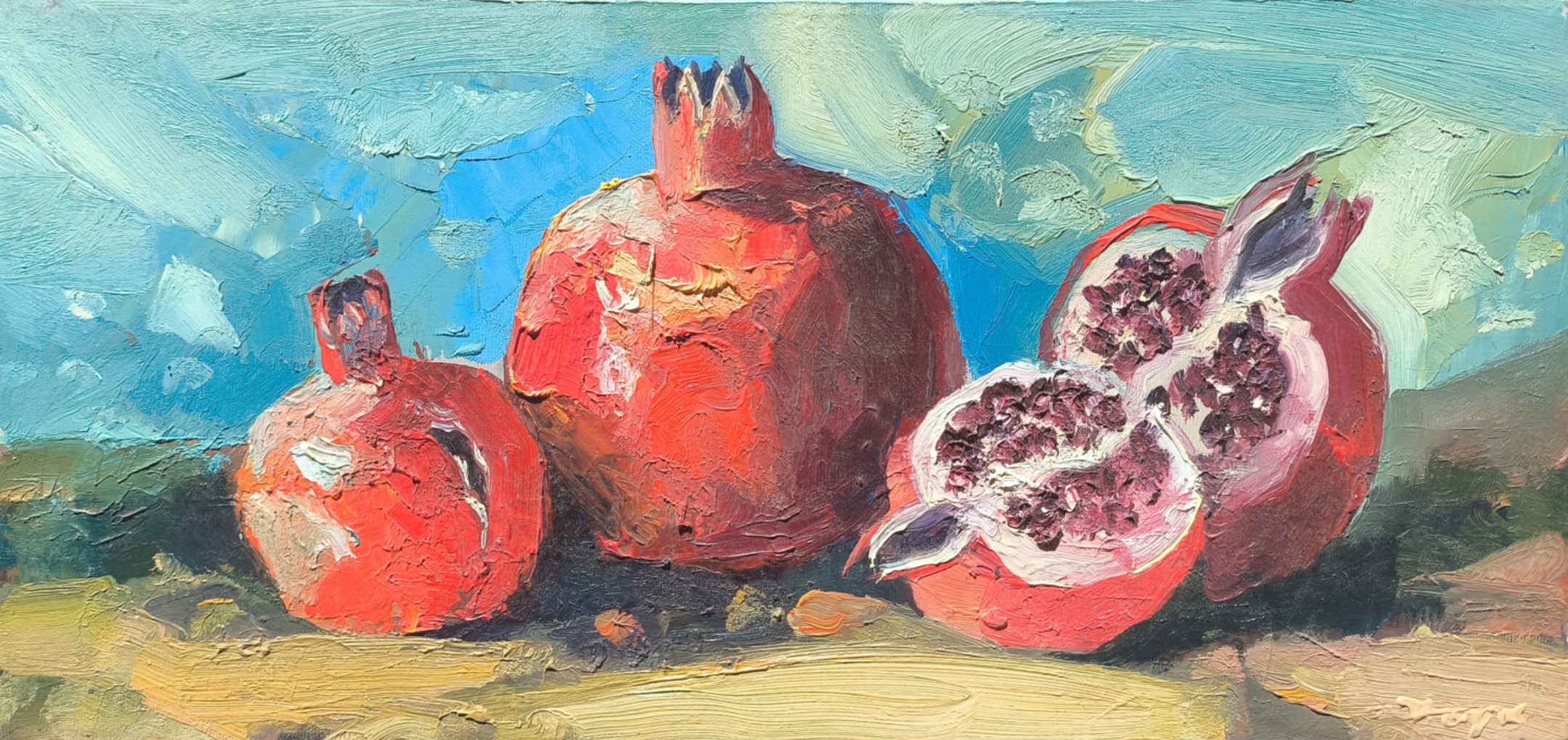 Nature morte de grenades, deux entières et une ouverte révélant ses grains, sur fond bleu — Hayk Miqayelyan
